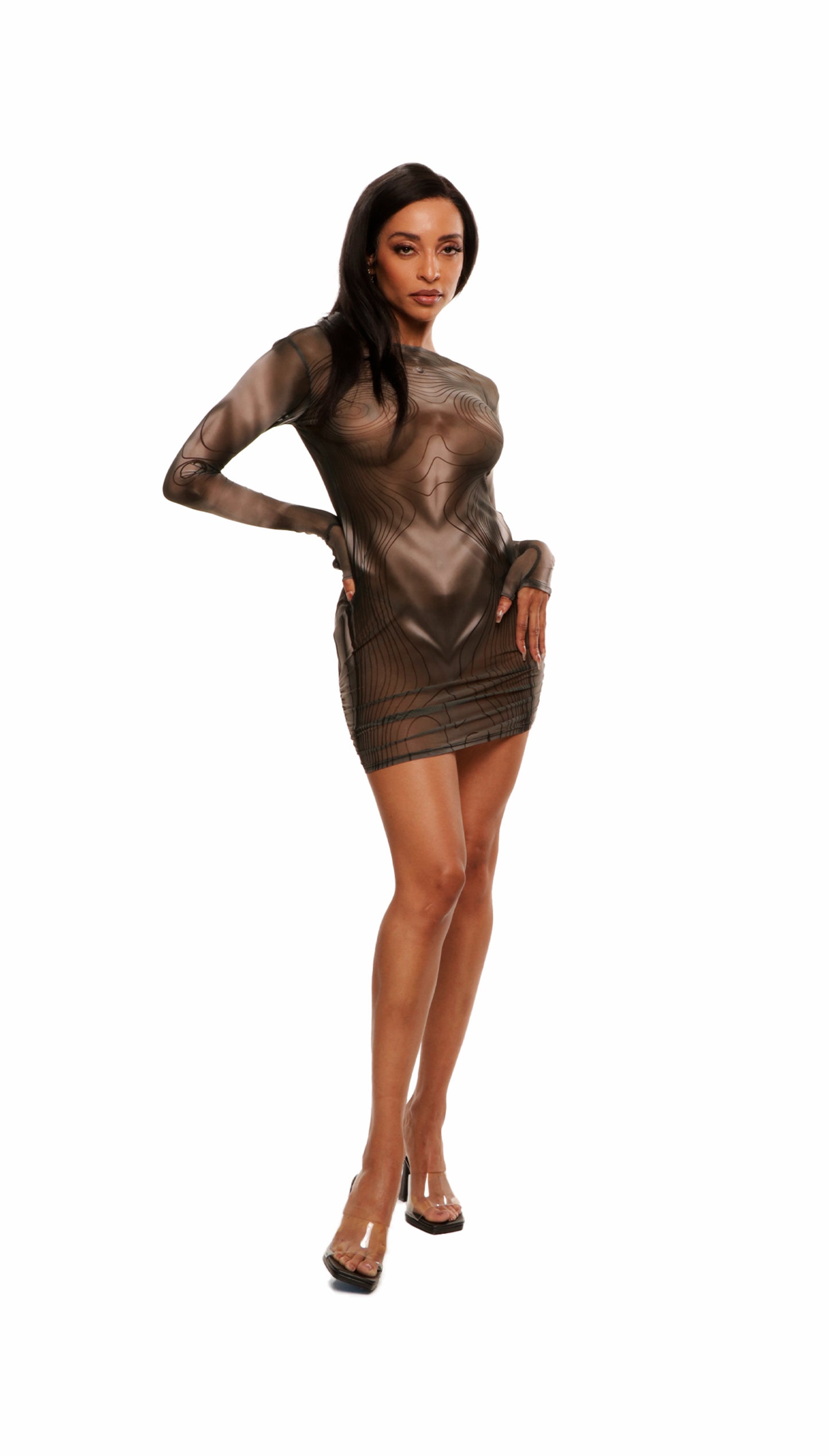 Woman who looks like Beyoncé or Aaliyah wears a grey or gray printed body contouring stretch mesh dress with gauntlet sleeves and open back detail with adjustable clear strap