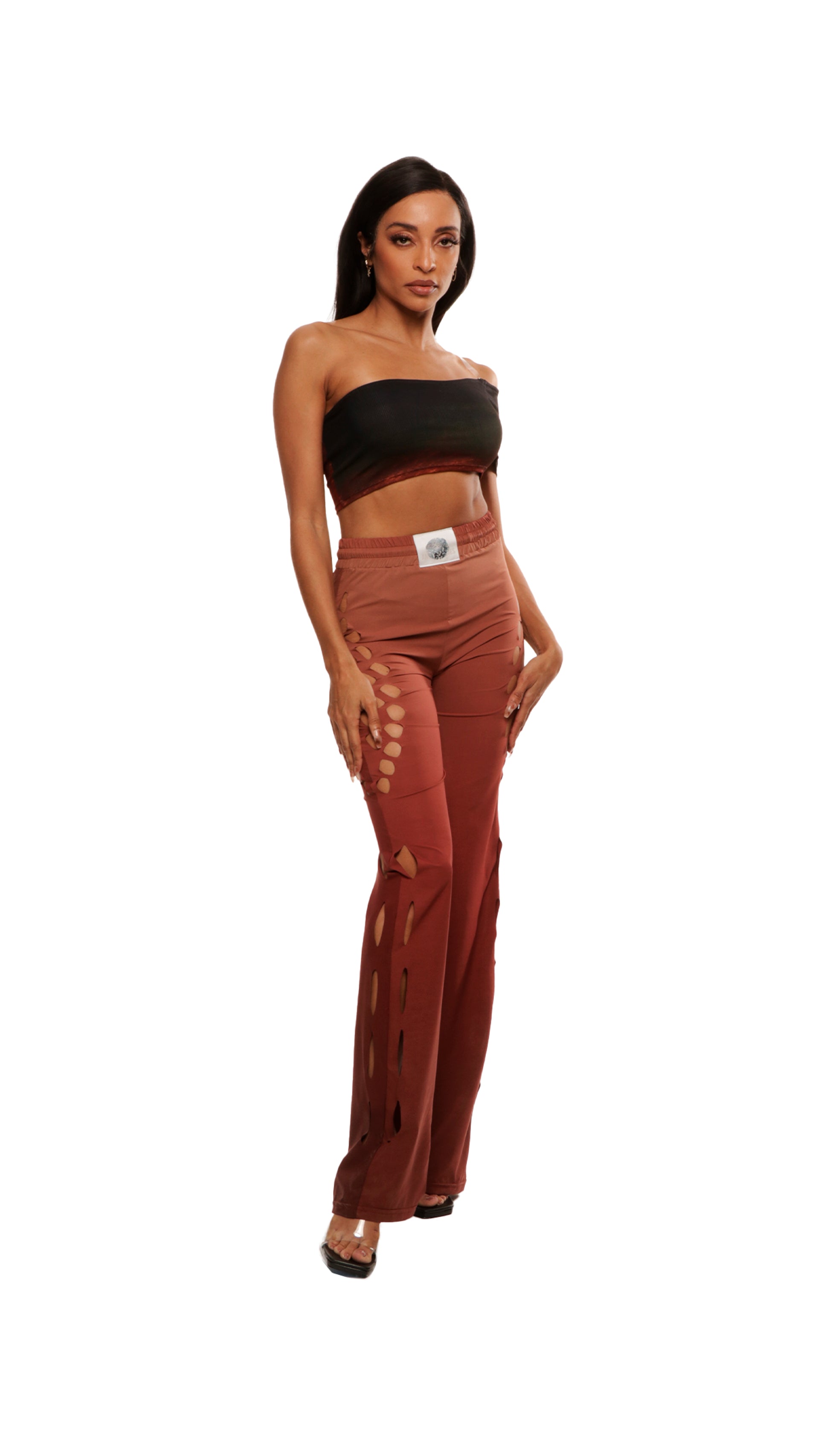 Woman who looks like Beyoncé or Aaliyah wears gradient brown toned asymmetrical top with clear strap, side view