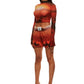 Woman who looks like Beyoncé or Aaliyah wears a cosmic sunset on mars printed long sleeve mesh top with gauntlet sleeve, side view