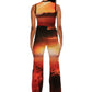 Woman who looks like Beyoncé or Aaliyah wears cosmic Mars sunset printed wide leg pant, back view 