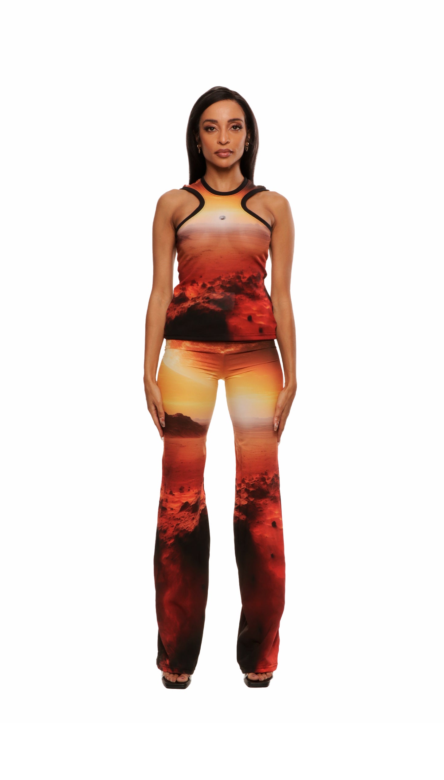 Woman who looks like Beyoncé or Aaliyah wears a sleeveless sunset on Mars printed compression mesh top with razor neck detail 