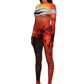 Woman wears Mars sunset print wetsuit or catsuit with chrome detail across chest and QR logo with heel cutout